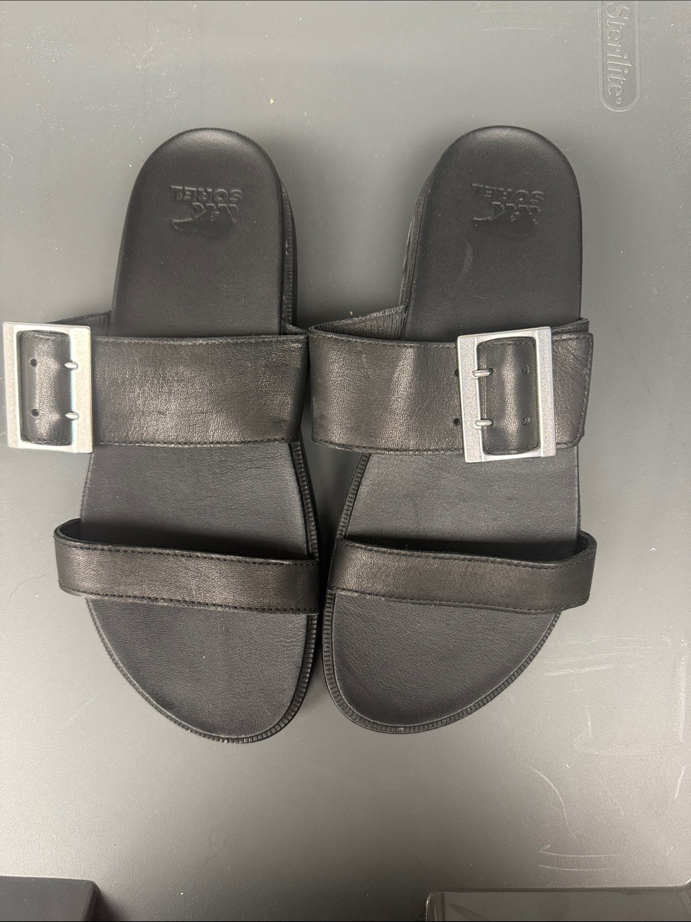Sorel Black Leather Dual-Strap Slide Sandals with Silver Buckles